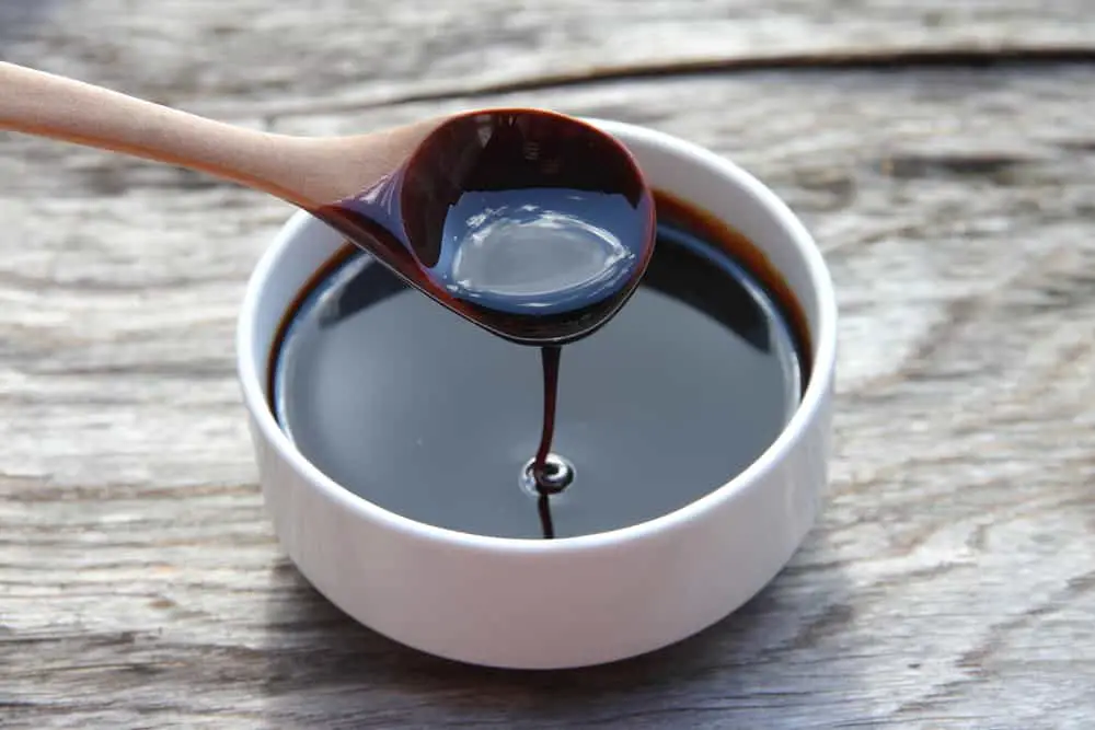 molasses that remains as a residue from the crystallization of cane sugar