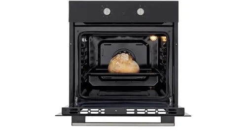 oven with open door and baked bread