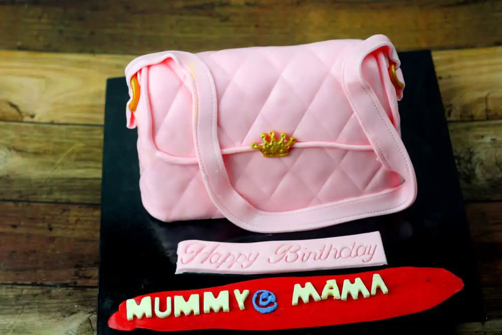 Pink handbag made of fondant birthday cake